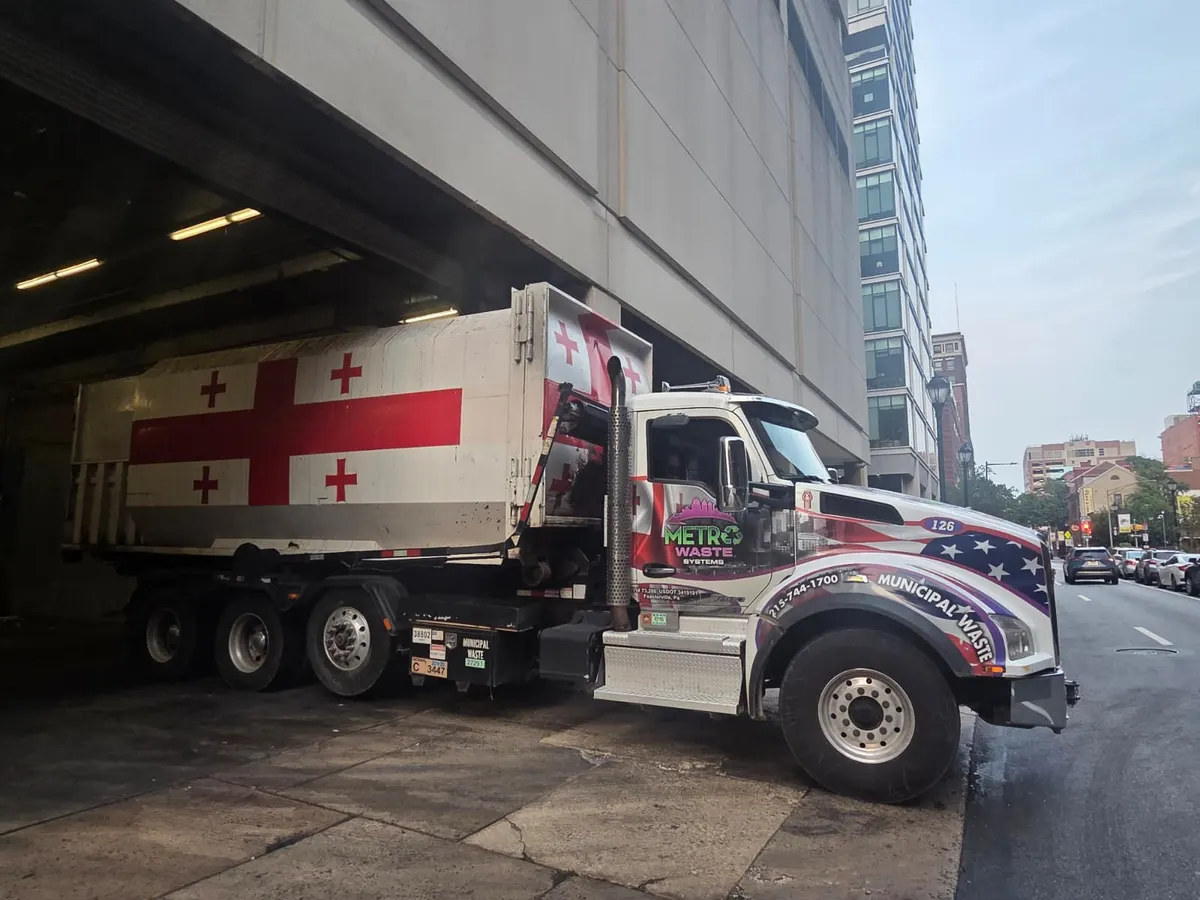 Self-contained commercial waste compactor serviced by Metro Waste Solutions