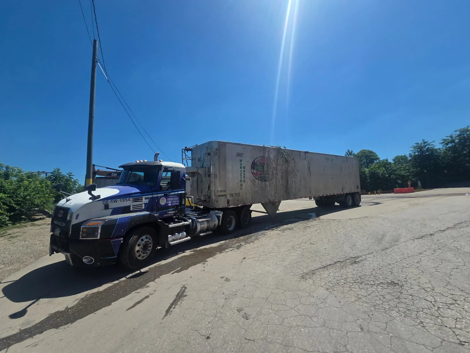 Commercial front-load and rear-load waste containers available from Metro Waste Solutions in Philadelphia — inventory photo 4