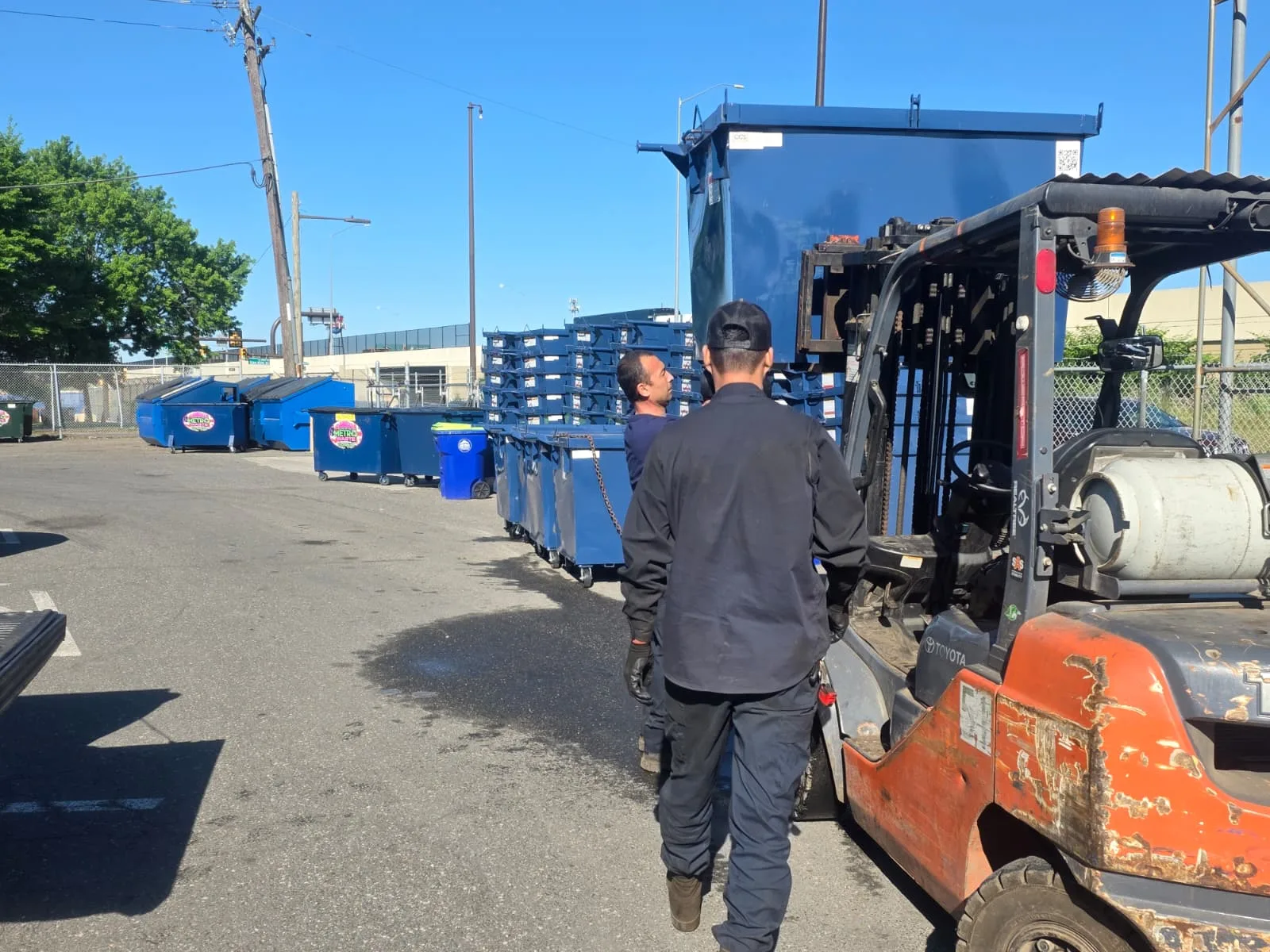 Metro Waste Solutions commercial garbage truck serving Philadelphia, PA — fleet operations photo 8 showing rear-load or front-load collection service