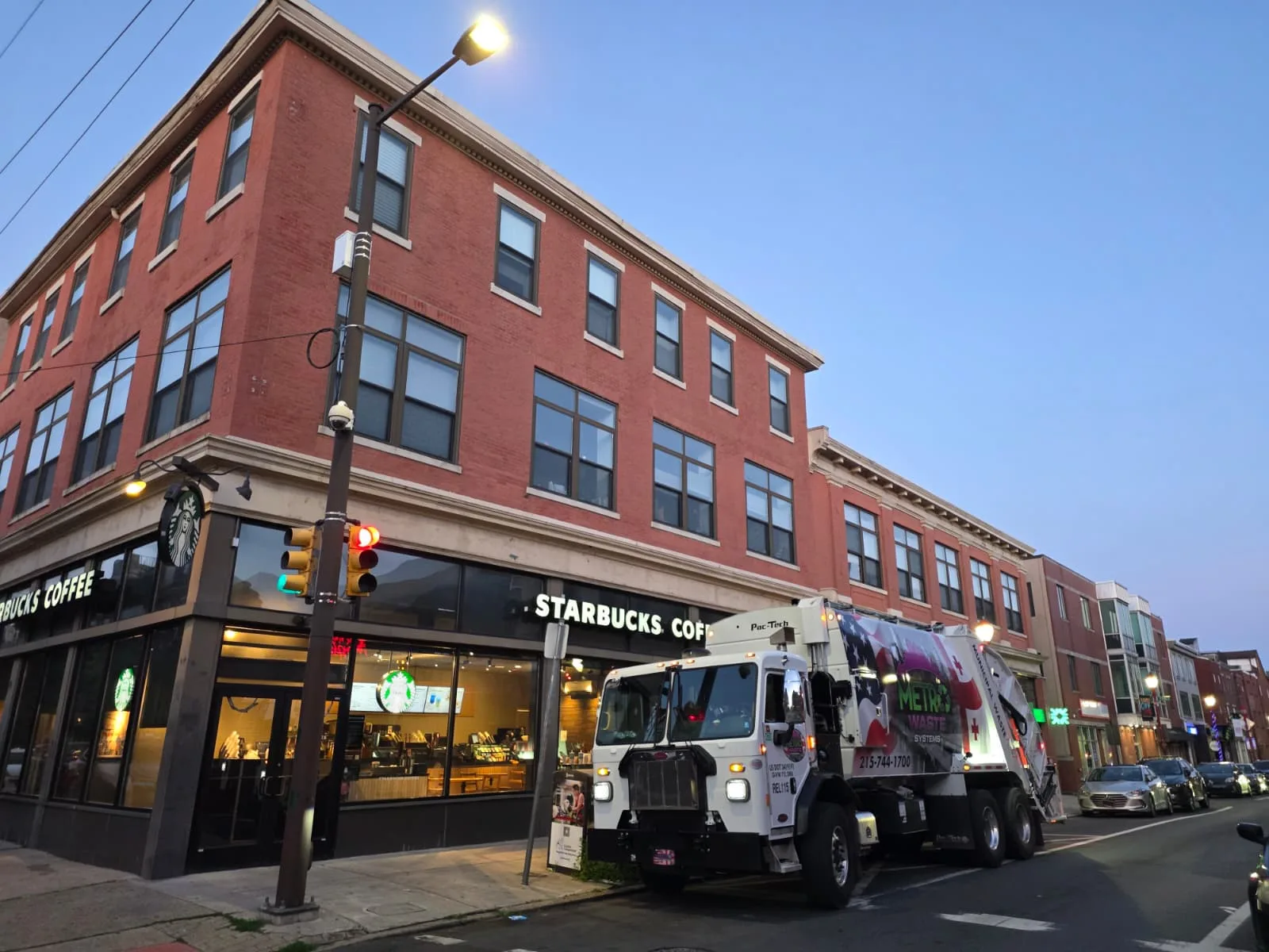 Metro Waste Solutions commercial garbage truck serving Philadelphia, PA — fleet operations photo 12 showing rear-load or front-load collection service
