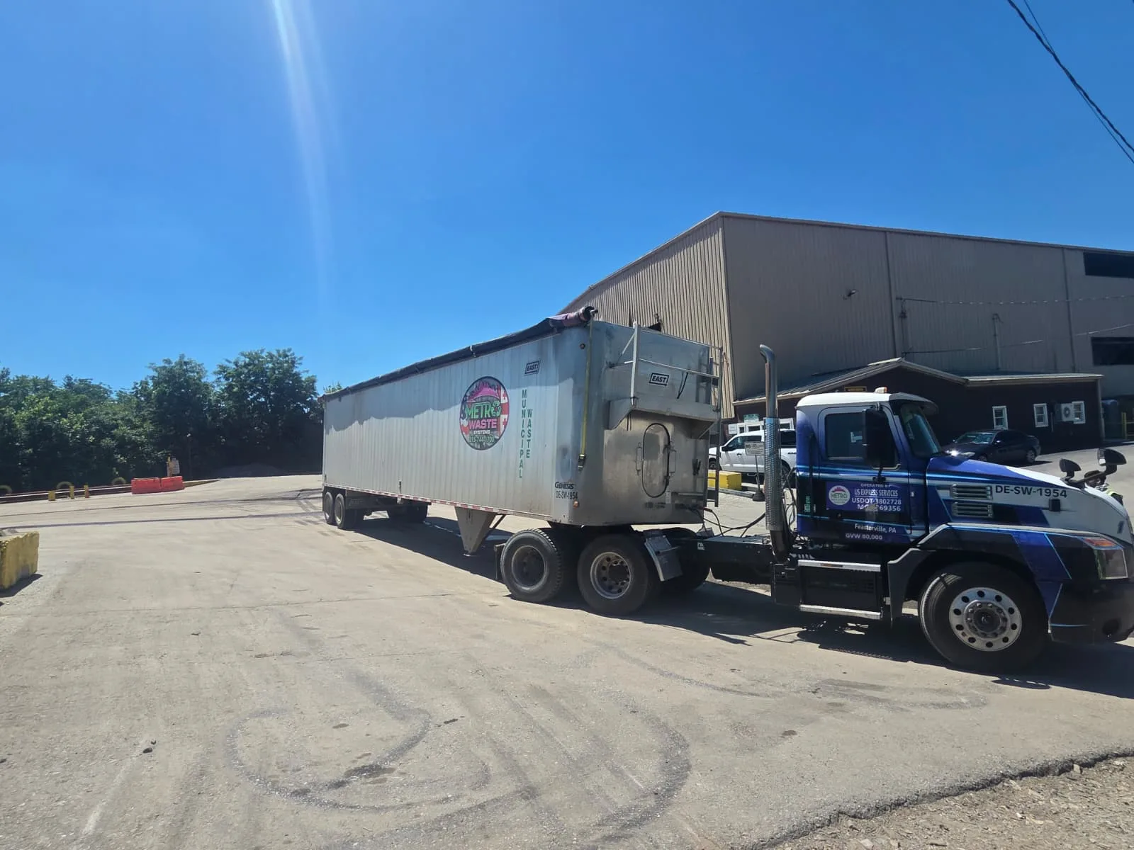 Construction debris and roll-off dumpster service at a Philadelphia area jobsite by Metro Waste Solutions — photo 4