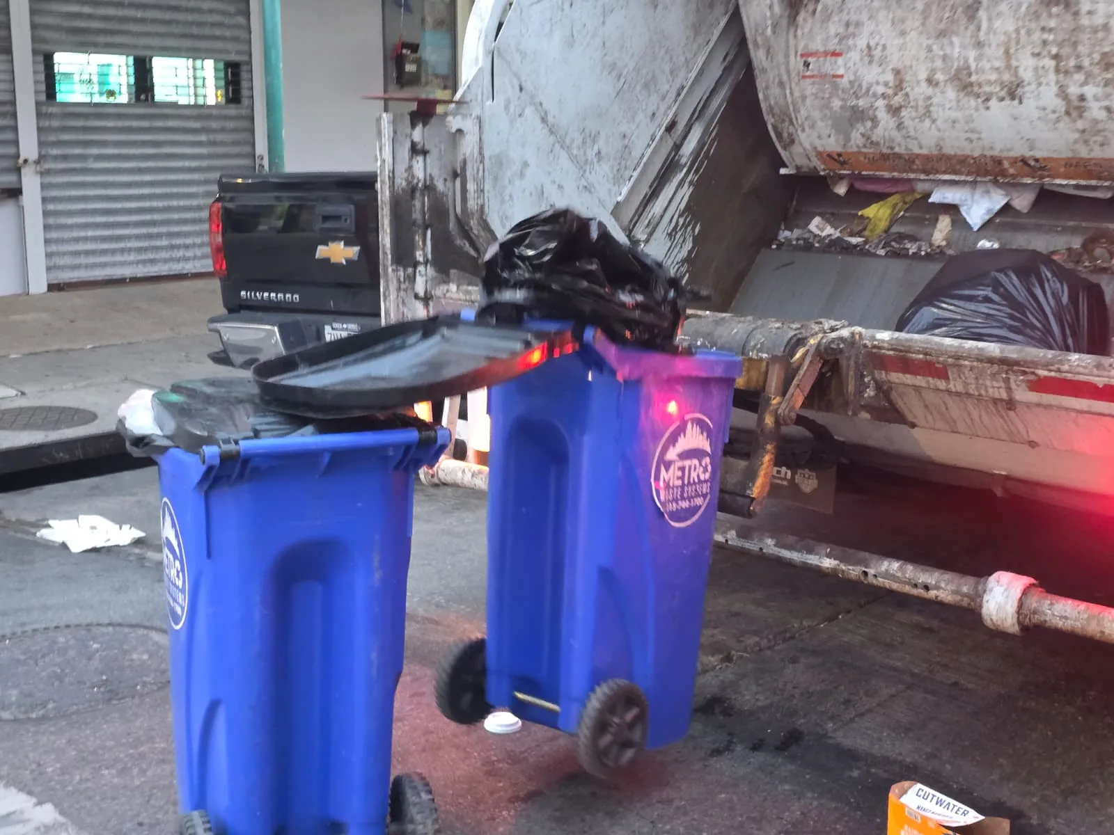 Inside Metro Waste Solutions fleet maintenance facility — commercial garbage trucks serviced for Philadelphia metro routes — photo 2