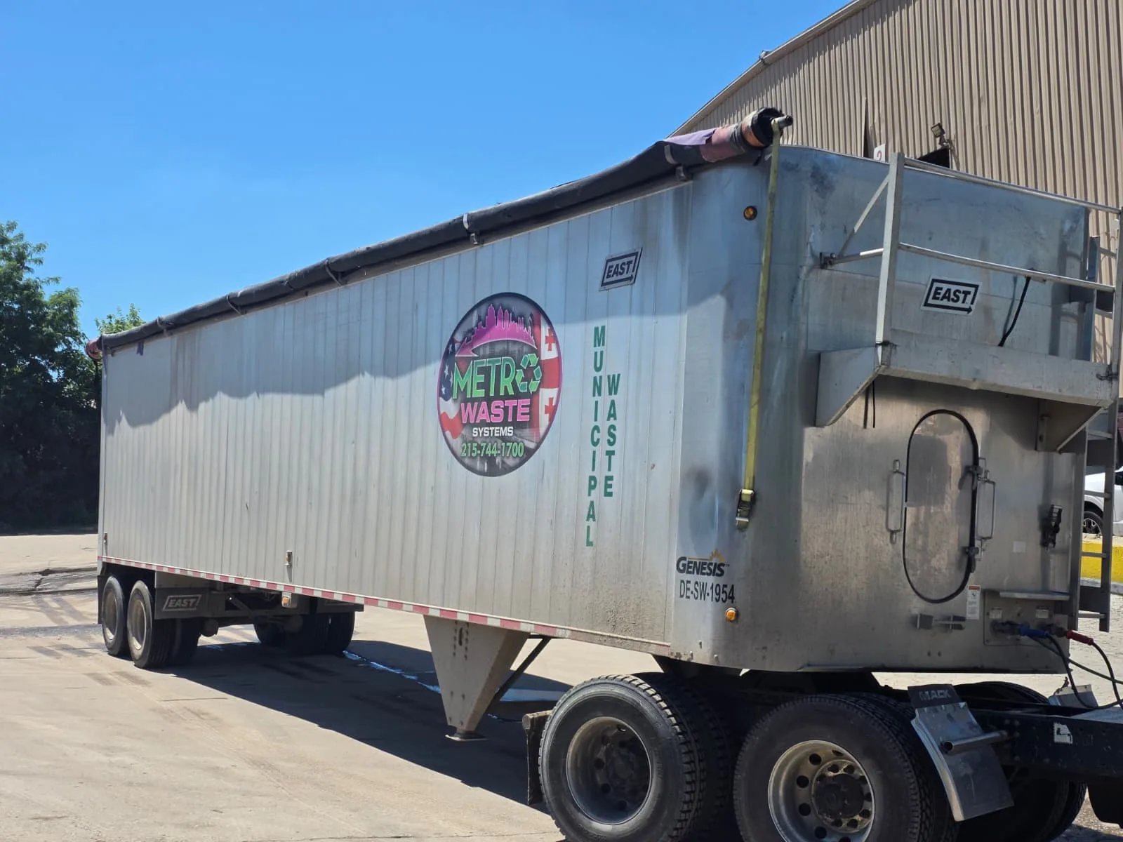 Inside Metro Waste Solutions fleet maintenance facility — commercial garbage trucks serviced for Philadelphia metro routes — photo 4