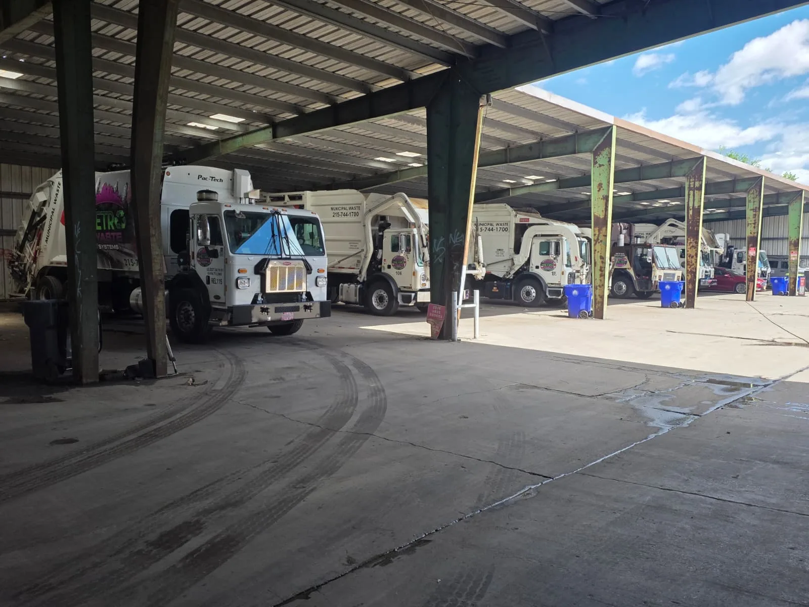 Inside Metro Waste Solutions fleet maintenance facility — commercial garbage trucks serviced for Philadelphia metro routes — photo 7