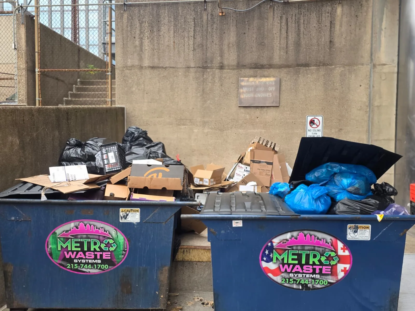 Front-load commercial dumpster service truck operated by Metro Waste Solutions in the Philadelphia area — image 2