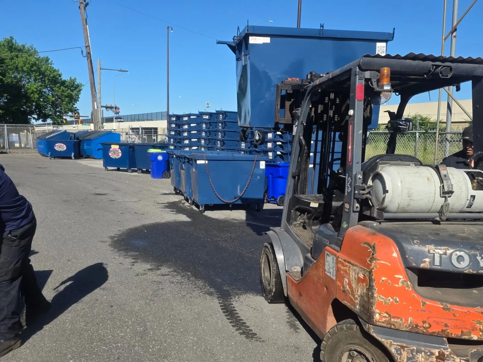 Front-load commercial dumpster service truck operated by Metro Waste Solutions in the Philadelphia area — image 8