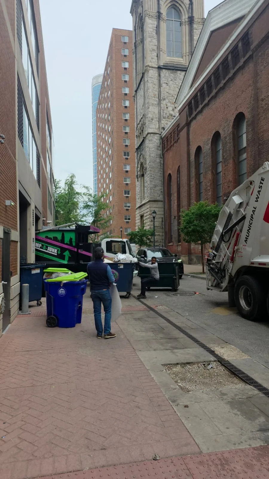 Front-load commercial dumpster service truck operated by Metro Waste Solutions in the Philadelphia area — image 10