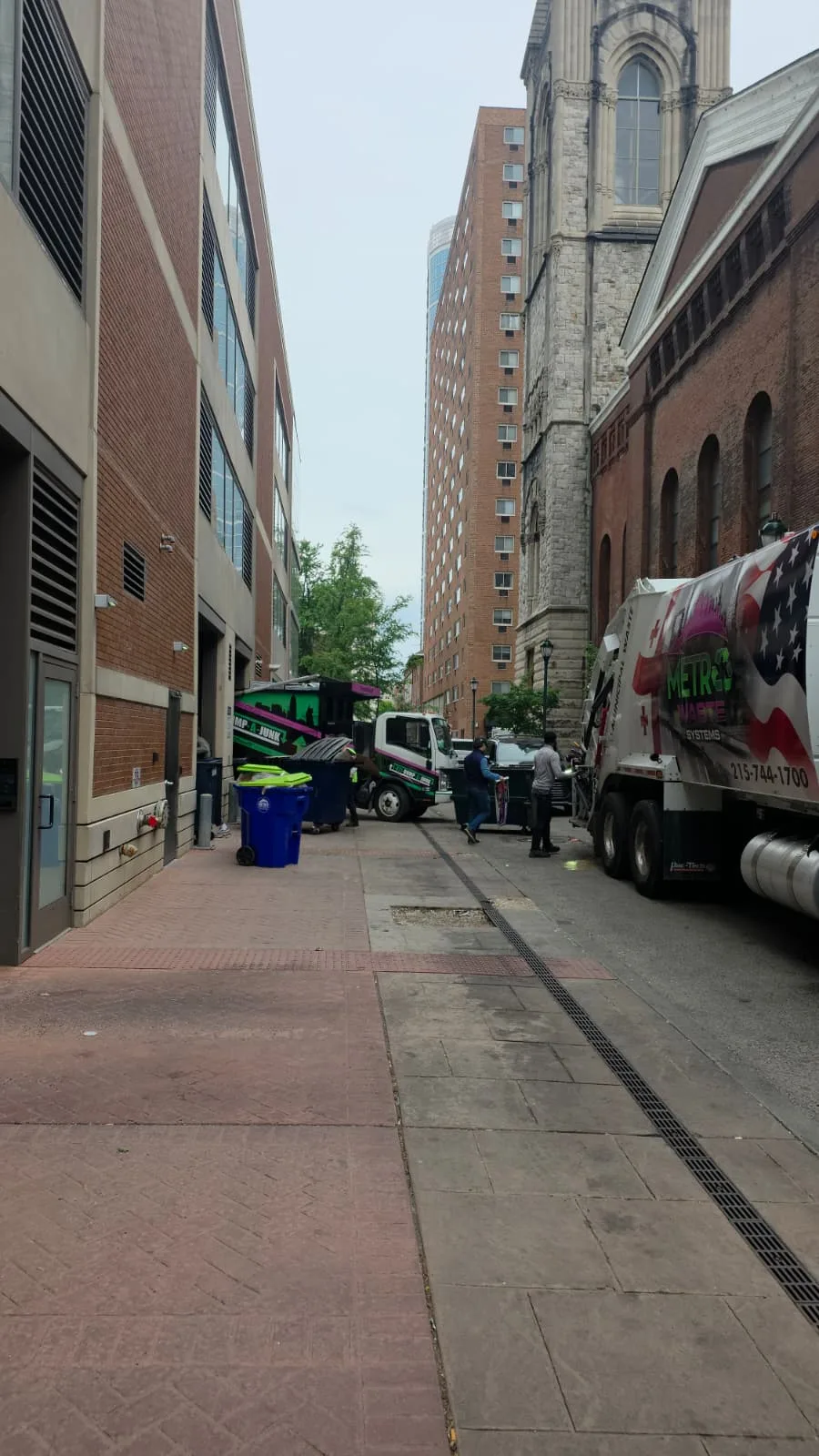 Front-load commercial dumpster service truck operated by Metro Waste Solutions in the Philadelphia area — image 11