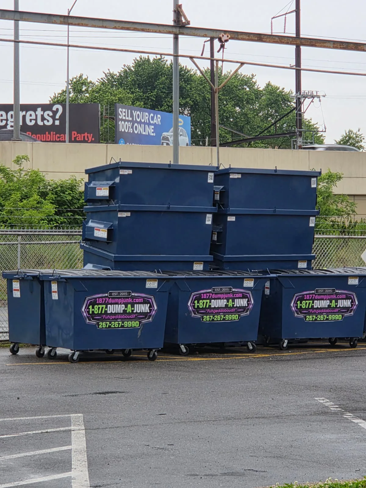 Rear-load commercial waste collection truck from Metro Waste Solutions on a Philadelphia metro route — photo 9