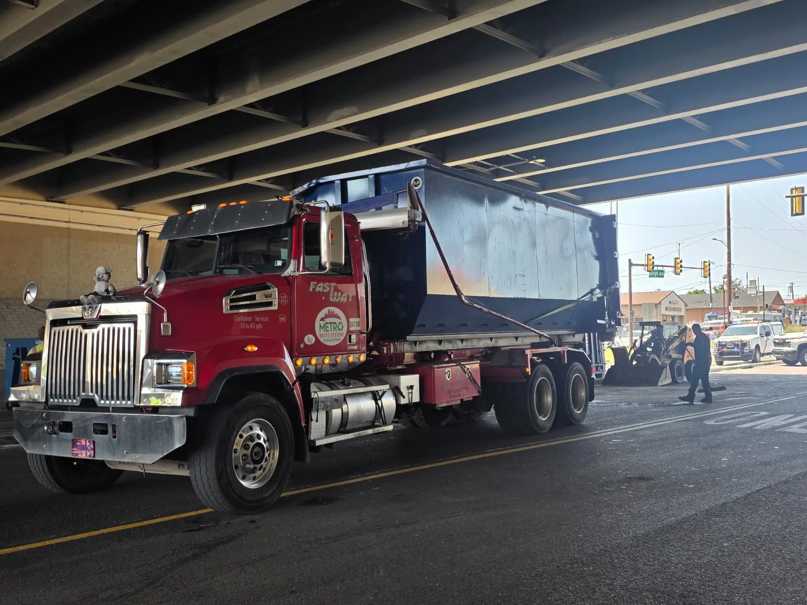 Metro Waste Solutions roll-off delivery in the Philadelphia metro area — real fleet photo 12