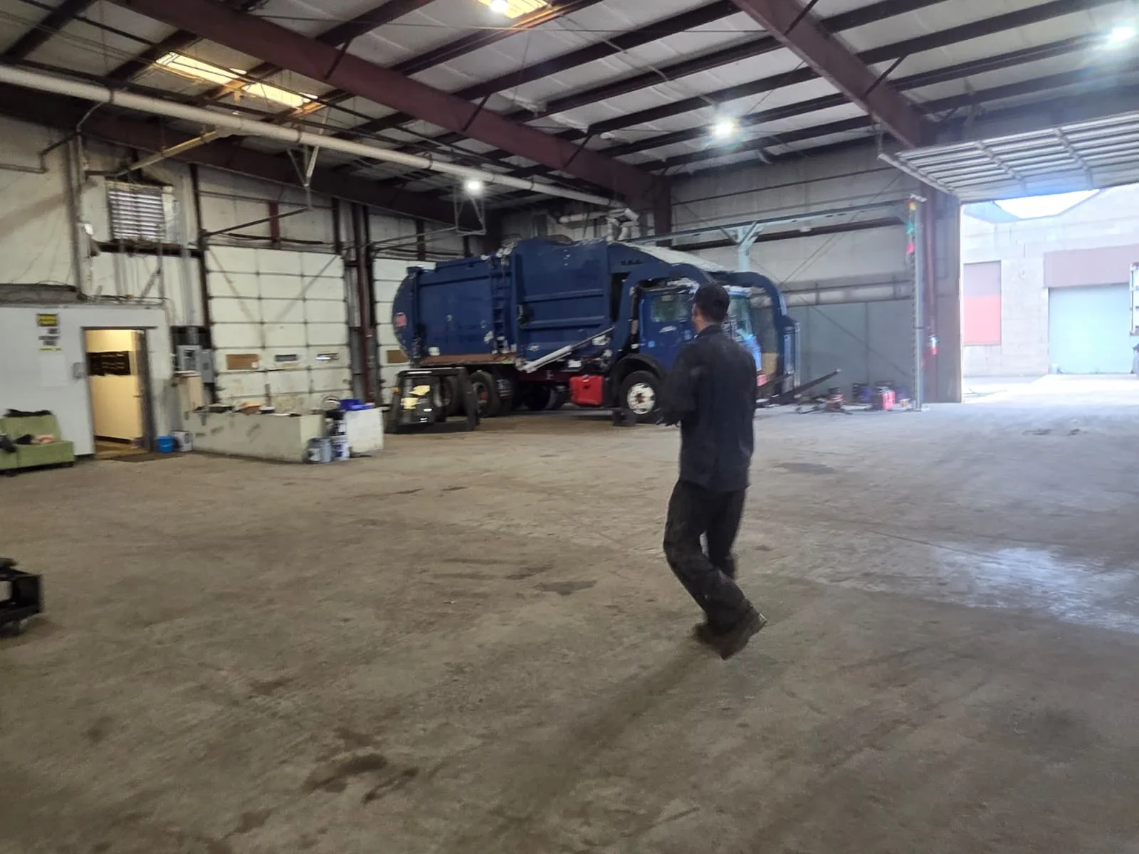 Roll-off dumpster delivery and open-top container placement by Metro Waste Solutions for construction and commercial projects — photo 5