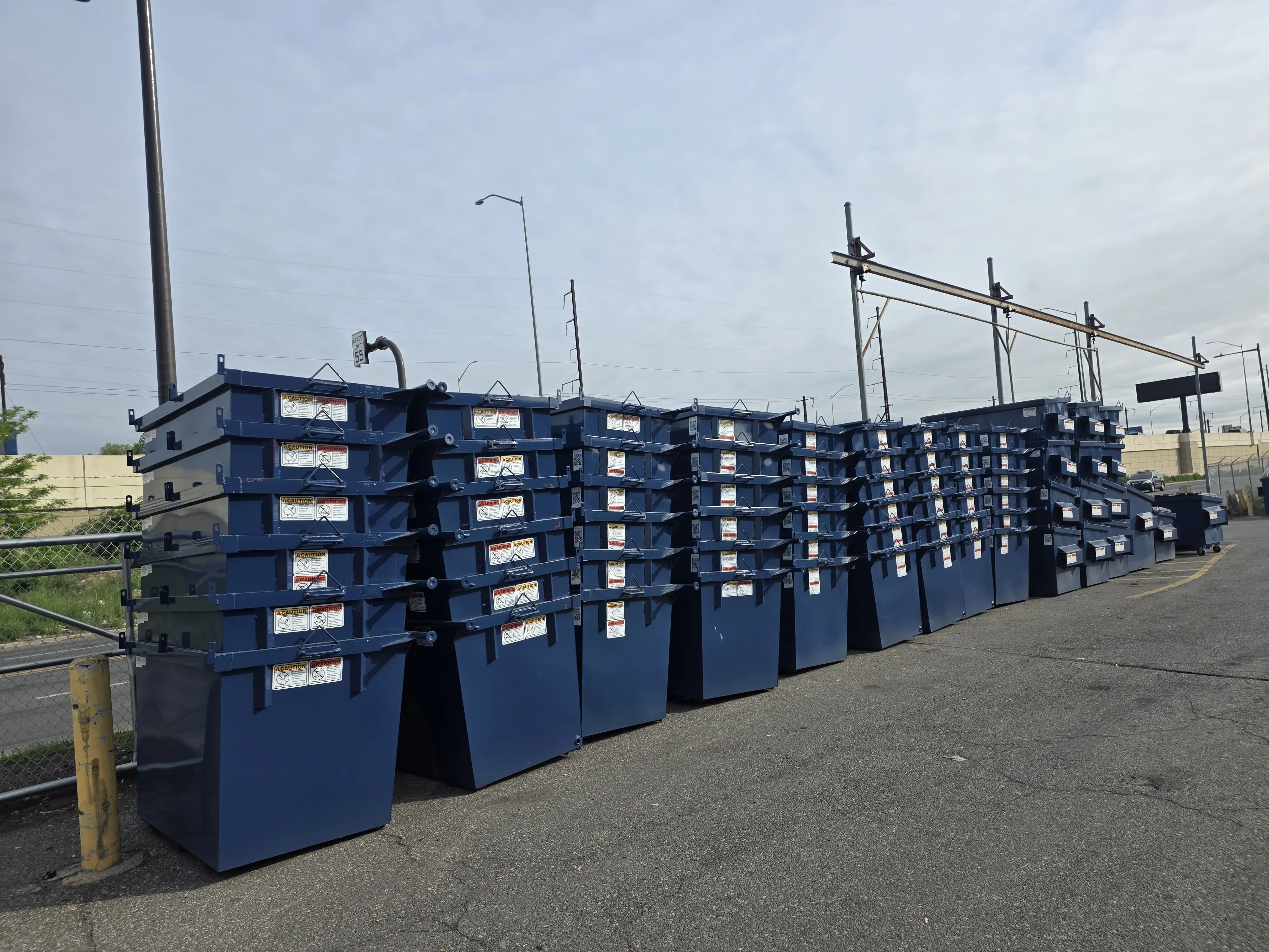 Roll-off dumpster delivery and open-top container placement by Metro Waste Solutions for construction and commercial projects — photo 11