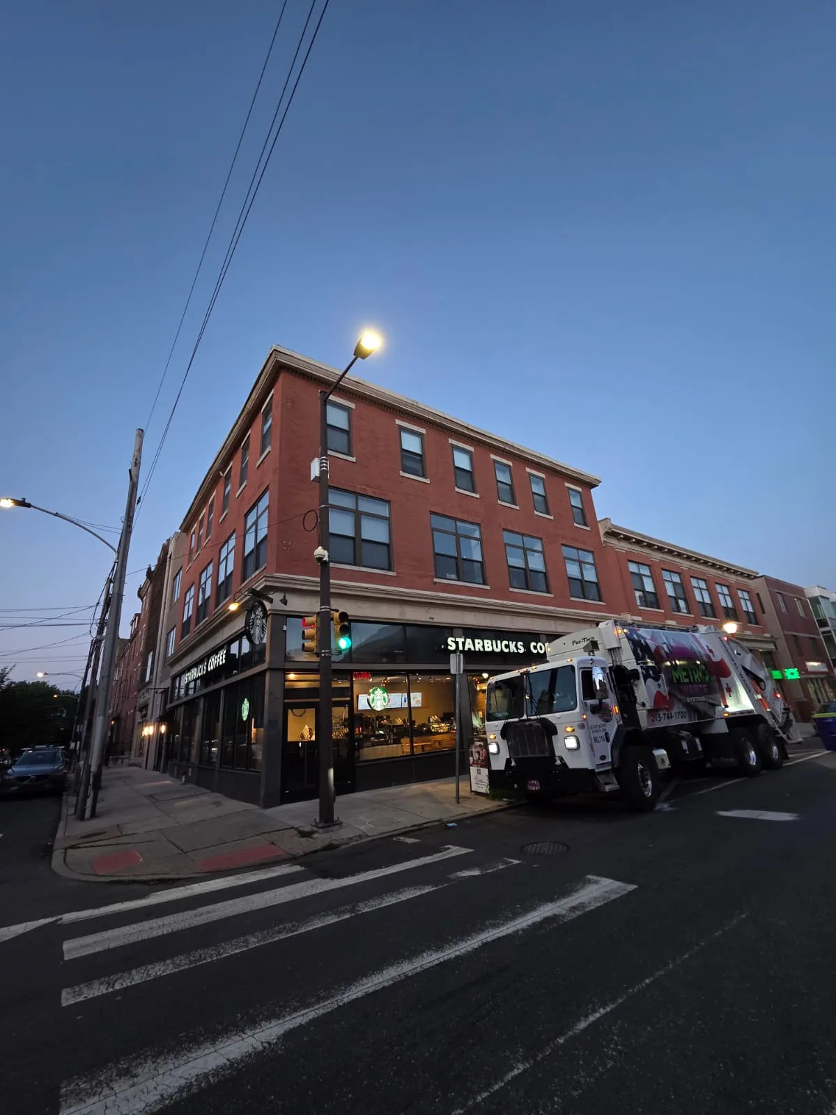 Roll-off dumpster delivery and open-top container placement by Metro Waste Solutions for construction and commercial projects — photo 13